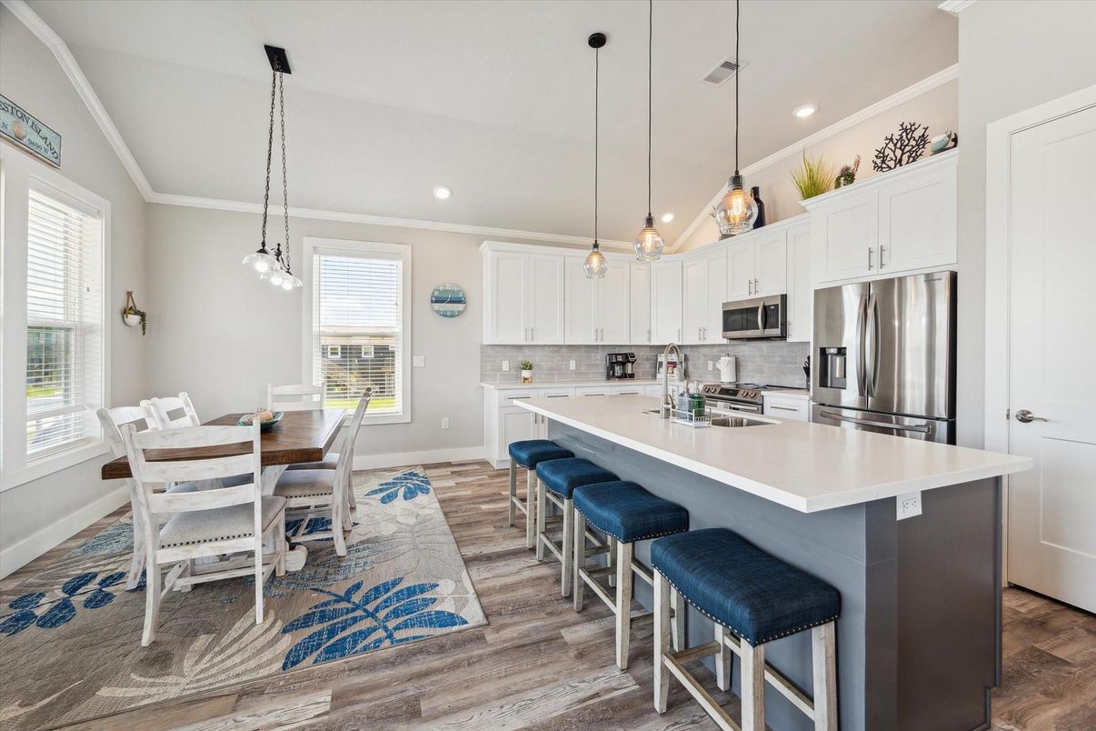 Dining room, Interior, Kitchen, Pendant Lights, Recessed Lighting, Stainless Steel Appliances, Wood Texture Flooring