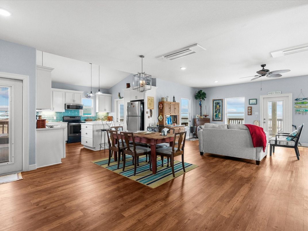 Dining room, Interior, Kitchen, Living room, Pendant Lights, Recessed Lighting, Stainless Steel Appliances, Wood Texture Flooring