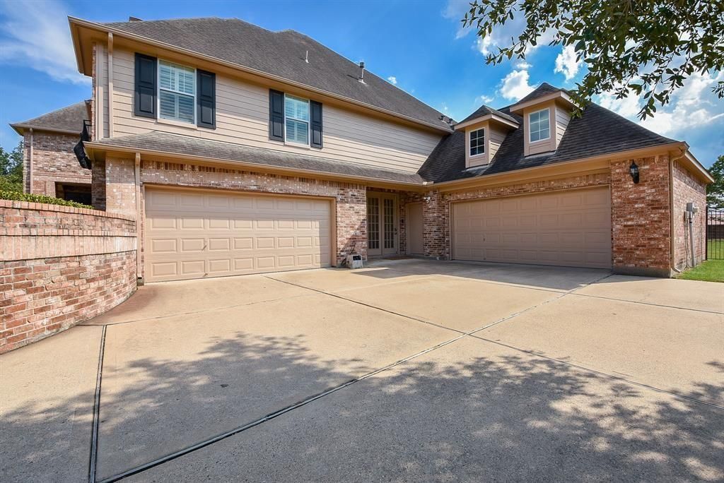 Attached, Exterior, Facade, Brick Facade, American Craftsman