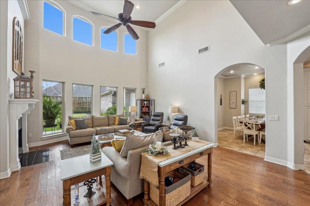 Dining room, Fireplace, Interior, Living room, Recessed Lighting, Wood Texture Flooring