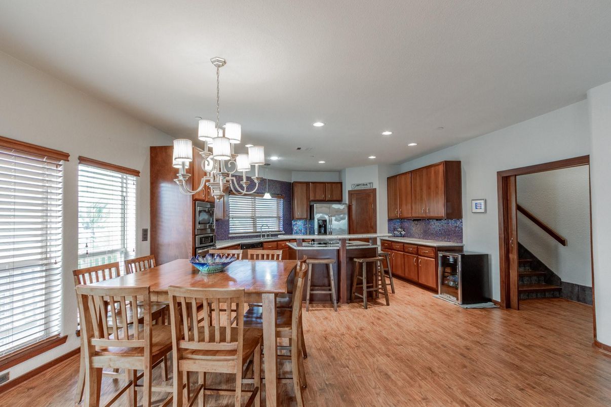 Chandelier, Dining room, Interior, Kitchen, Recessed Lighting, Stainless Steel Appliances, Wood Texture Flooring