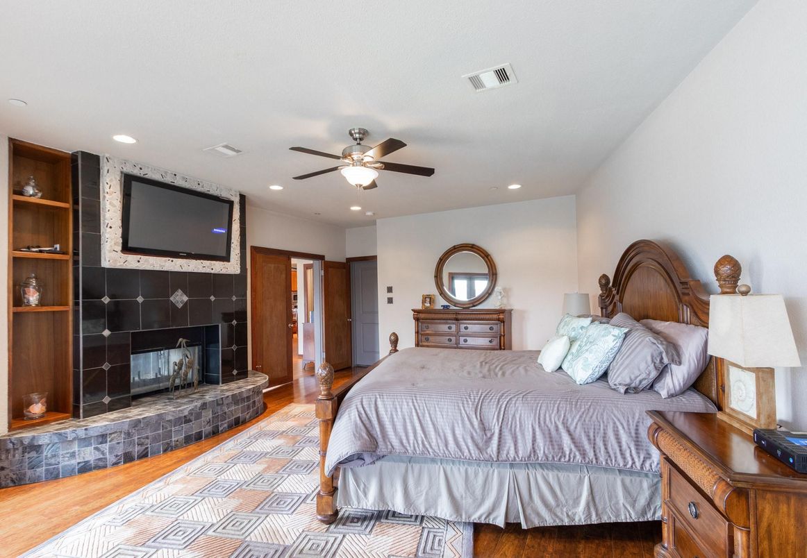 Bedroom, Fireplace, Interior, Recessed Lighting, Wood Texture Flooring