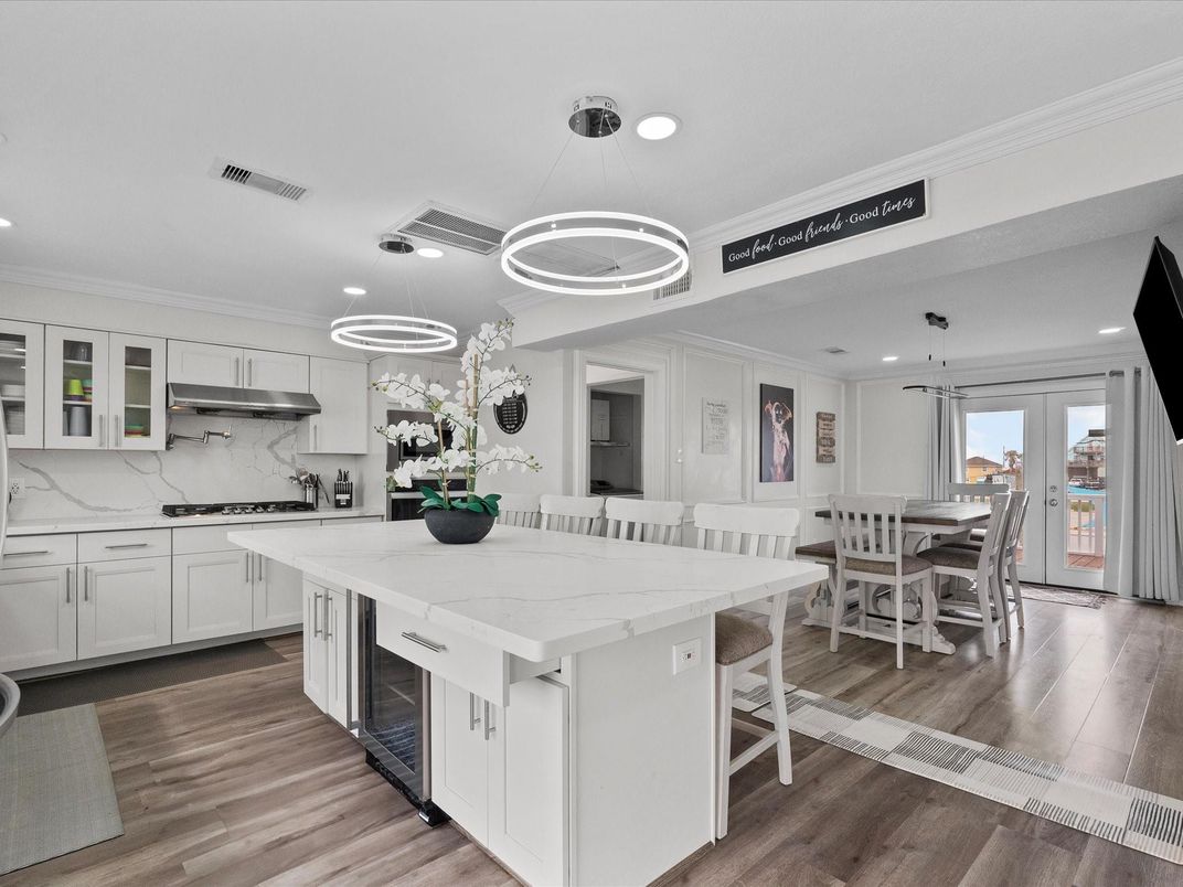 Dining room, Interior, Kitchen, Marble Walls, Pendant Lights, Recessed Lighting, Wood Texture Flooring