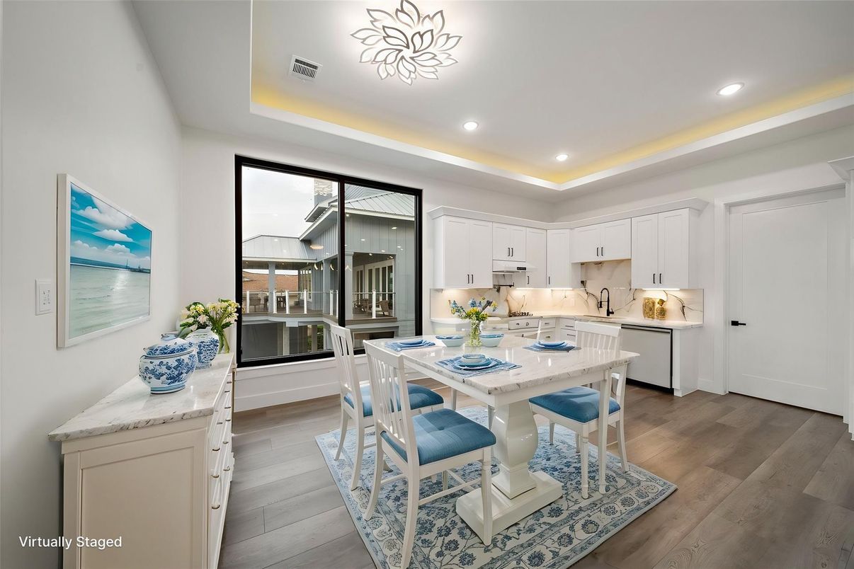 Dining room, Interior, Kitchen, Recessed Lighting, Stainless Steel Appliances, Wood Texture Flooring