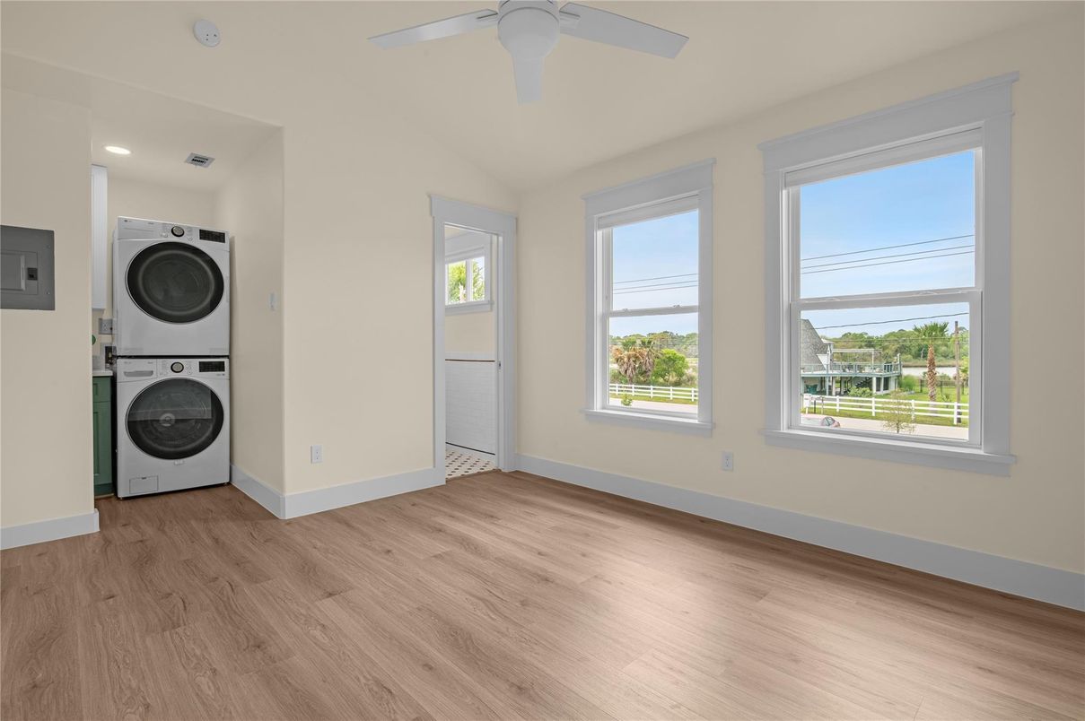 Empty room, Interior, Recessed Lighting, Utility Closets, Washer, Wood Texture Flooring