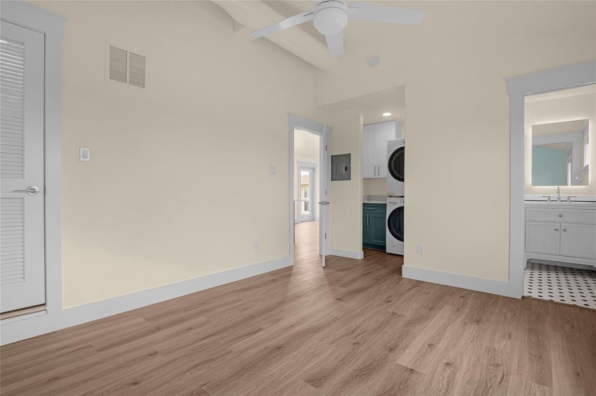 Empty room, Interior, Recessed Lighting, Utility Closets, Washer, Wood Texture Flooring