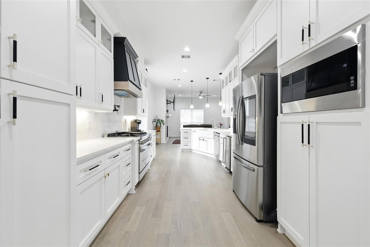 Interior, Kitchen, Pendant Lights, Recessed Lighting, Stainless Steel Appliances, Wood Texture Flooring