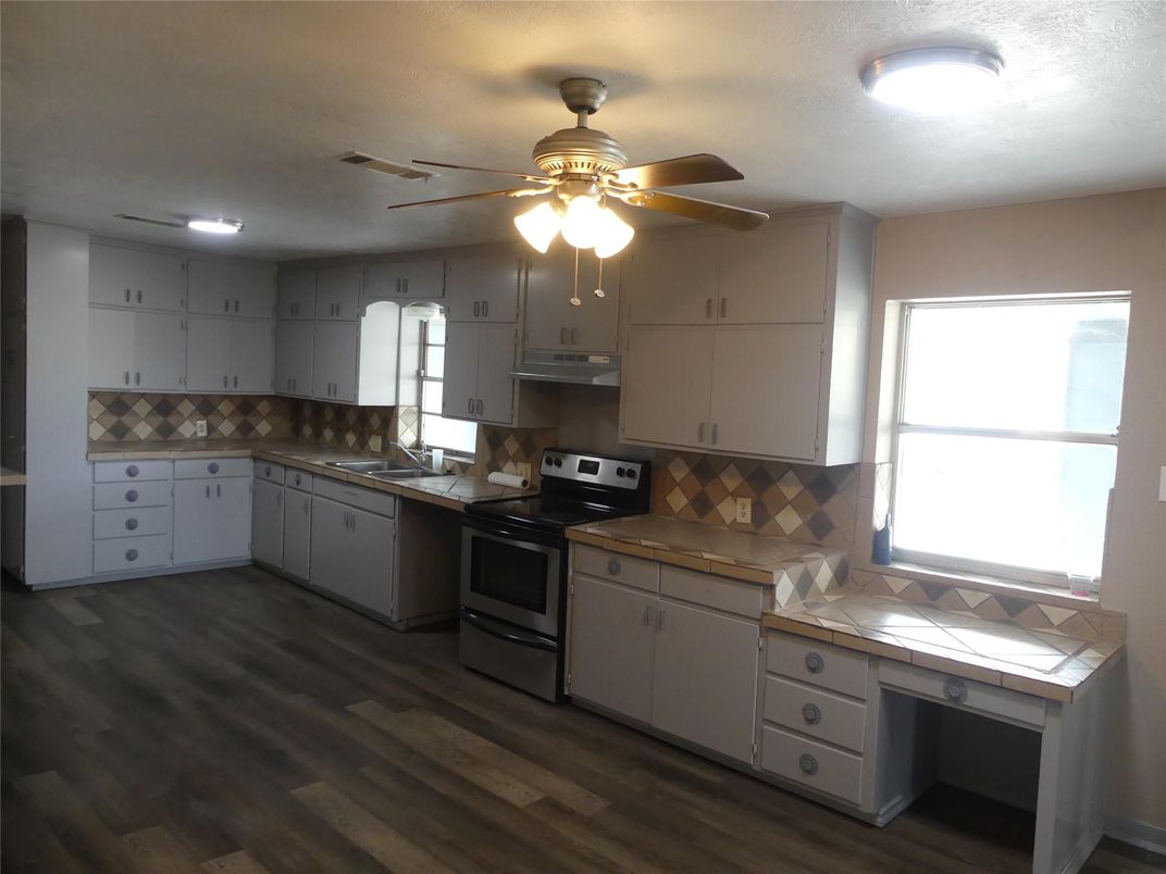 Interior, Kitchen, Tile Countertops, Wood Texture Flooring