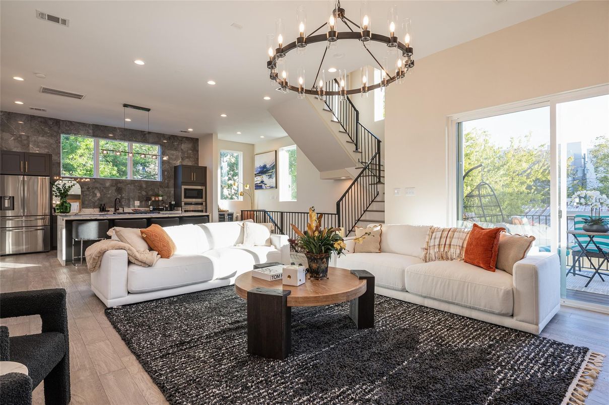 Chandelier, Interior, Kitchen, Living room, Pendant Lights, Recessed Lighting, Stainless Steel Appliances, Wood Texture Flooring