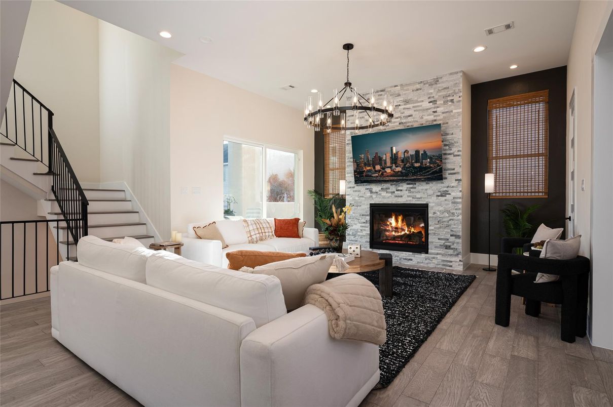 Fireplace, Interior, Living room, Pendant Lights, Recessed Lighting, Stone Walls, Wood Texture Flooring