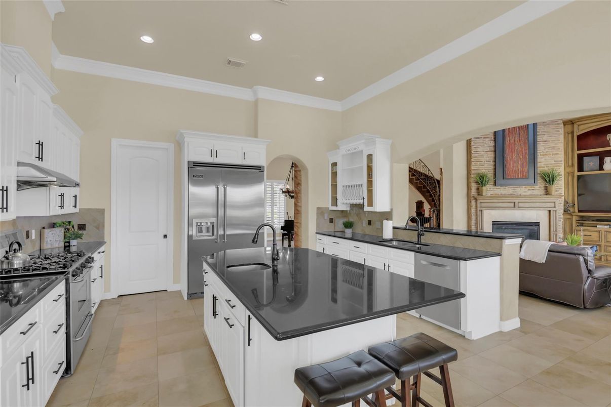 Fireplace, Interior, Kitchen, Living room, Recessed Lighting, Stainless Steel Appliances