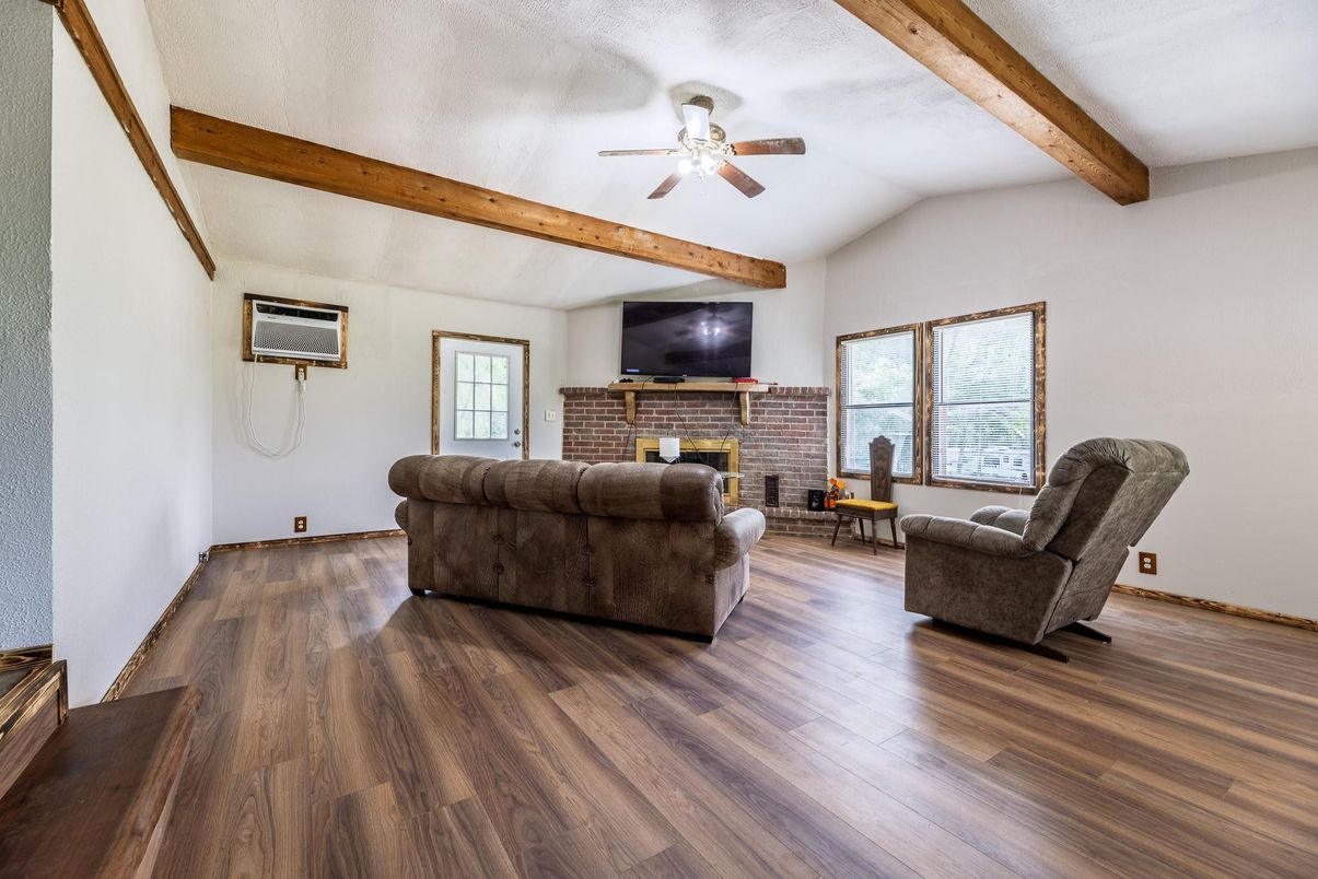 Fireplace, Interior, Living room, Stone Walls, Wooden Beams, Wood Texture Flooring