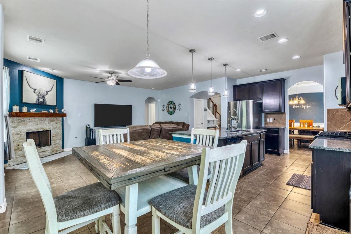 Dining room, Fireplace, Interior, Kitchen, Pendant Lights, Recessed Lighting, Stainless Steel Appliances