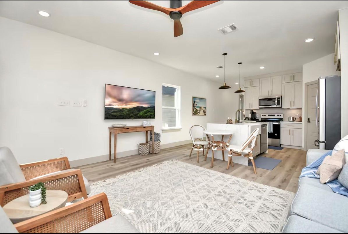 Dining room, Interior, Kitchen, Pendant Lights, Recessed Lighting, Stainless Steel Appliances, Wood Texture Flooring