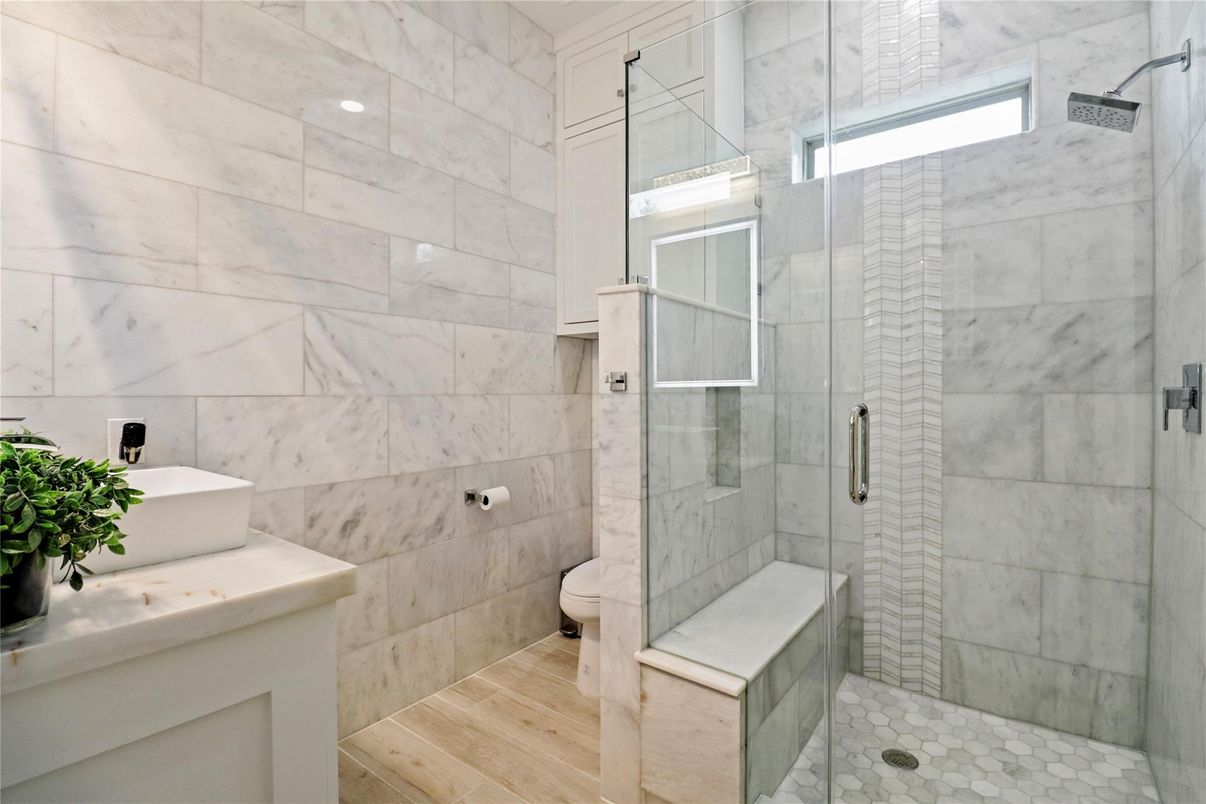 Bathroom, Glass Shower, Interior, Marble Walls, Wood Texture Flooring
