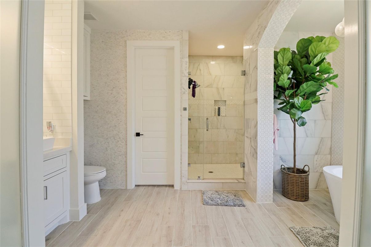 Bathroom, Glass Shower, Interior, Marble Walls, Recessed Lighting, Wood Texture Flooring