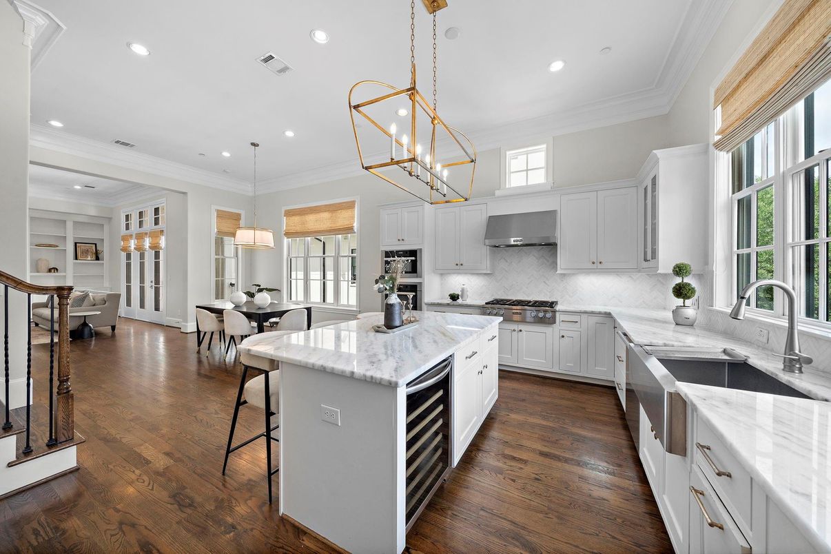 Dining room, Interior, Kitchen, Pendant Lights, Recessed Lighting, Stainless Steel Appliances, Wood Texture Flooring