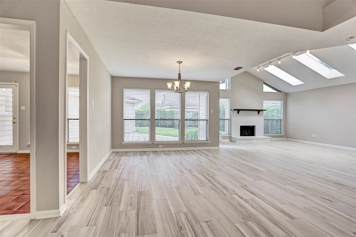 Chandelier, Empty room, Fireplace, Interior, Wood Texture Flooring