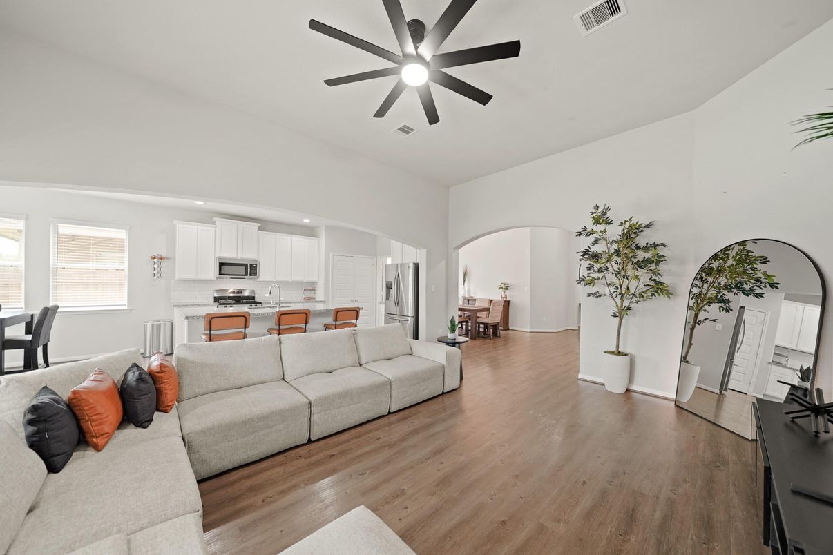 Dining room, Interior, Kitchen, Living room, Recessed Lighting, Stainless Steel Appliances, Wood Texture Flooring