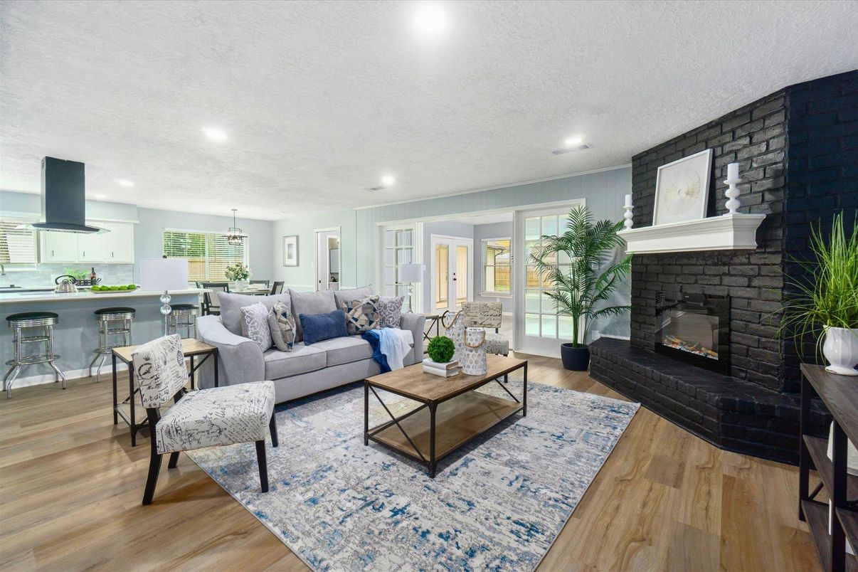 Fireplace, Interior, Kitchen, Living room, Pendant Lights, Recessed Lighting, Stone Walls, Wood Texture Flooring