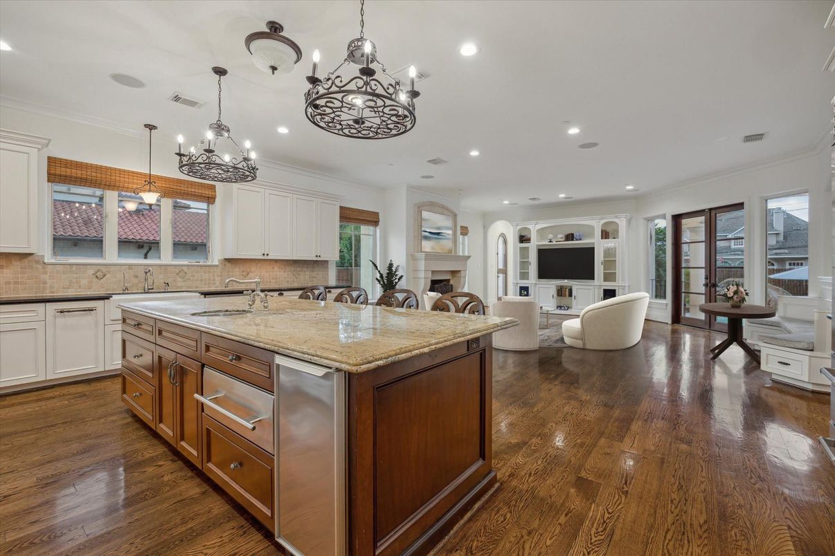 Chandelier, Fireplace, Interior, Kitchen, Living room, Recessed Lighting, Wood Texture Flooring