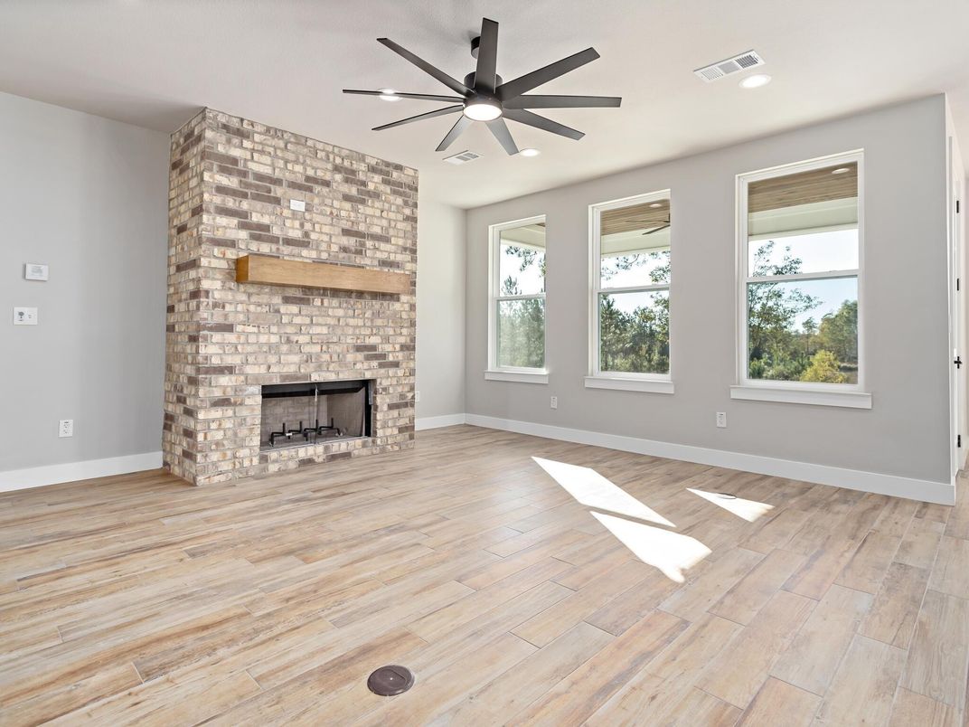 Empty room, Fireplace, Interior, Recessed Lighting, Wood Texture Flooring
