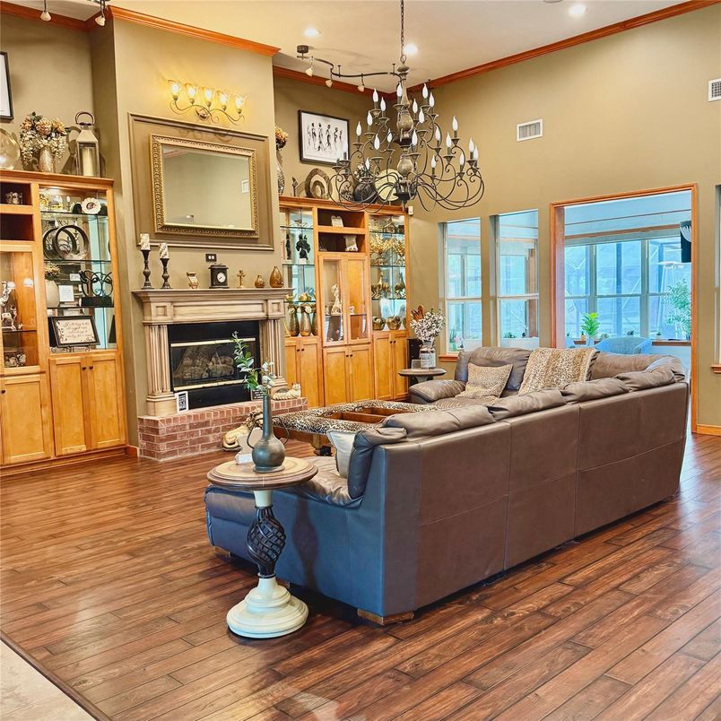 Chandelier, Fireplace, Interior, Living room, Recessed Lighting, Wood Texture Flooring