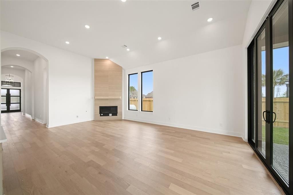 Empty room, Fireplace, Interior, Recessed Lighting, Wood Texture Flooring