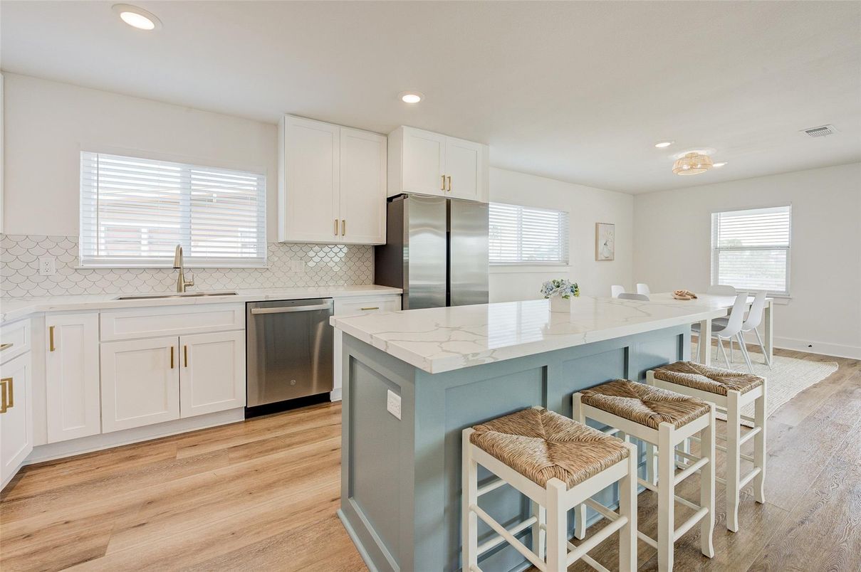 Dining room, Interior, Kitchen, Recessed Lighting, Stainless Steel Appliances, Wood Texture Flooring