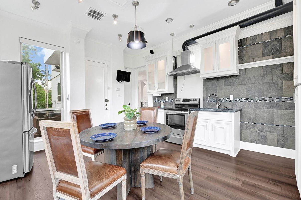 Dining room, Interior, Kitchen, Pendant Lights, Recessed Lighting, Stainless Steel Appliances, Wood Texture Flooring