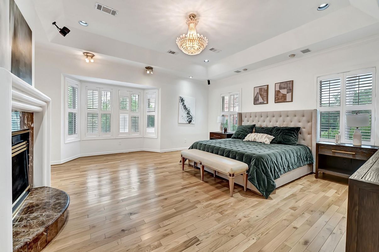 Bedroom, Chandelier, Fireplace, Interior, Recessed Lighting, Wood Texture Flooring