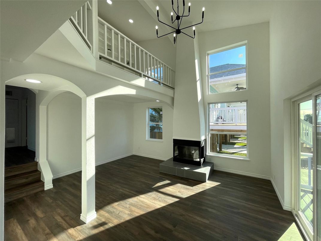 Fireplace, Interior, Pendant Lights, Recessed Lighting, Wood Texture Flooring