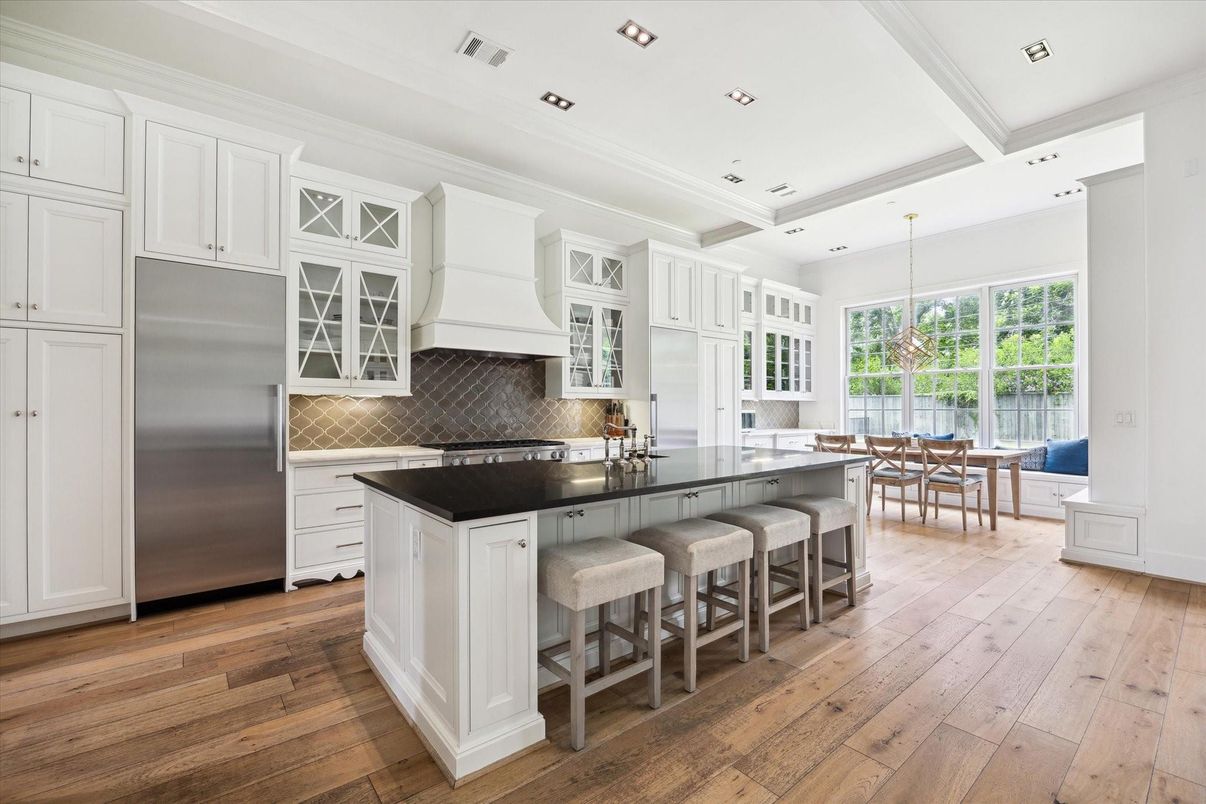 Dining room, Interior, Kitchen, Pendant Lights, Recessed Lighting, Stainless Steel Appliances, Wood Texture Flooring