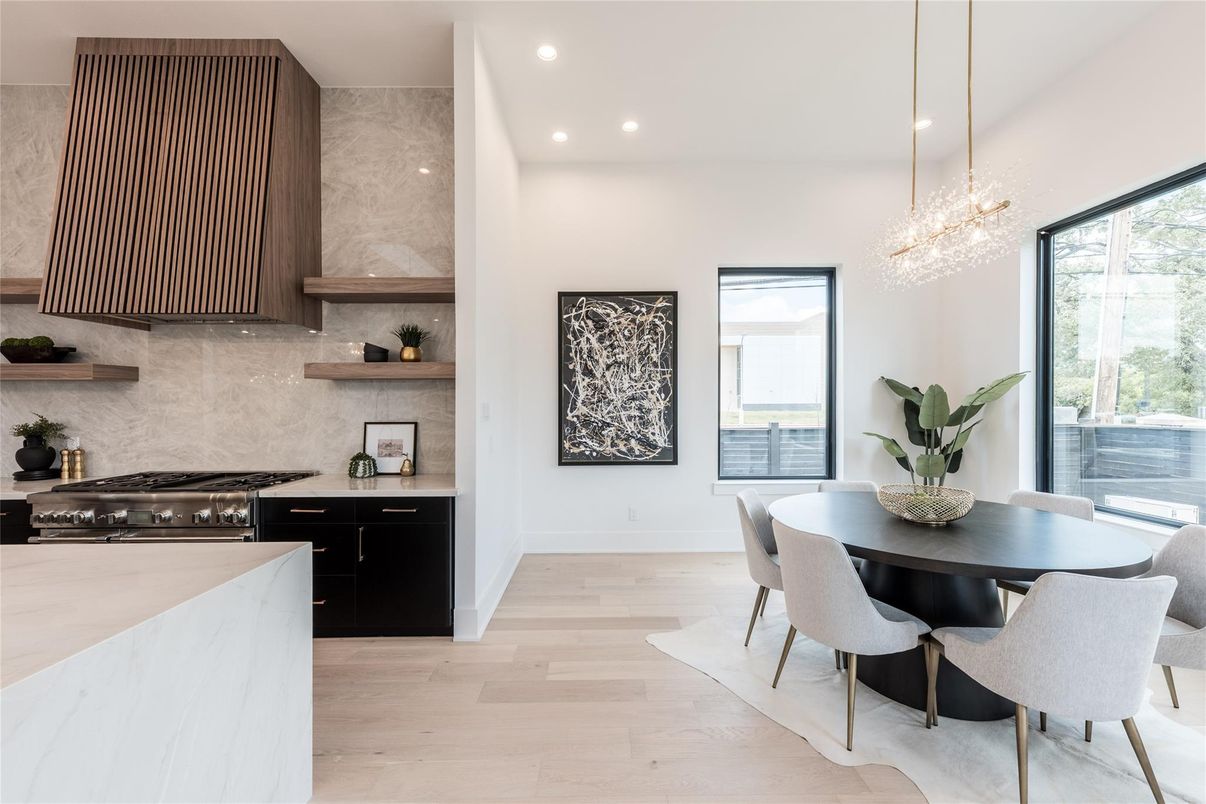 Chandelier, Dining room, Interior, Kitchen, Pendant Lights, Recessed Lighting, Stainless Steel Appliances, Wood Texture Flooring