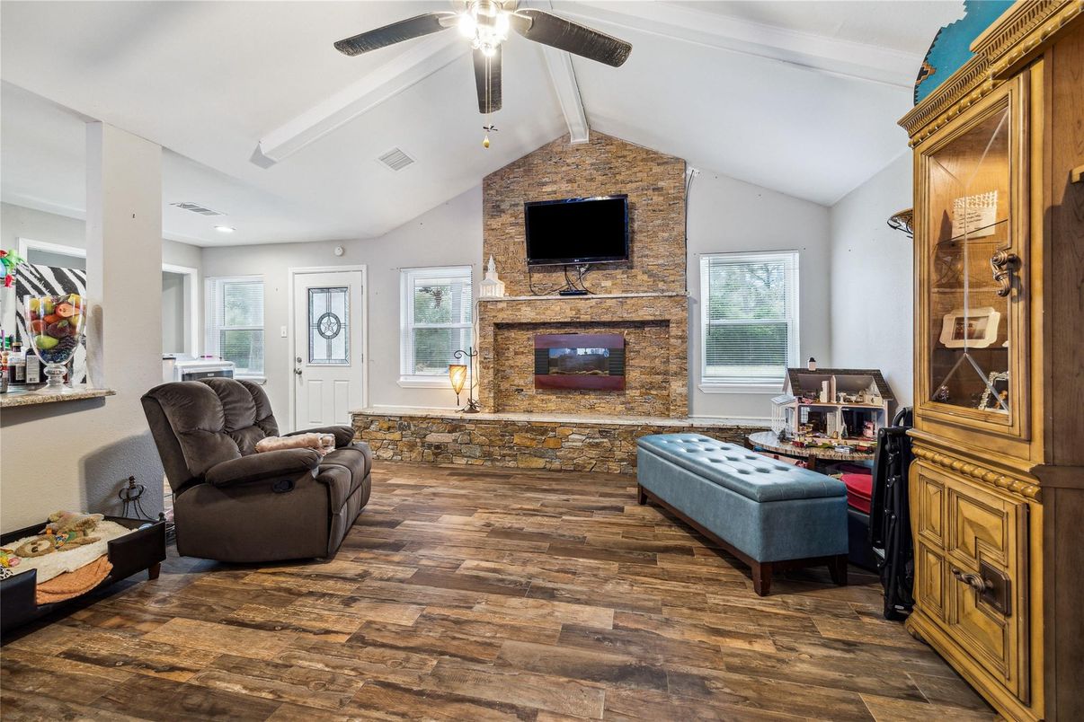 Fireplace, Interior, Recessed Lighting, Stone Walls, Wood Texture Flooring
