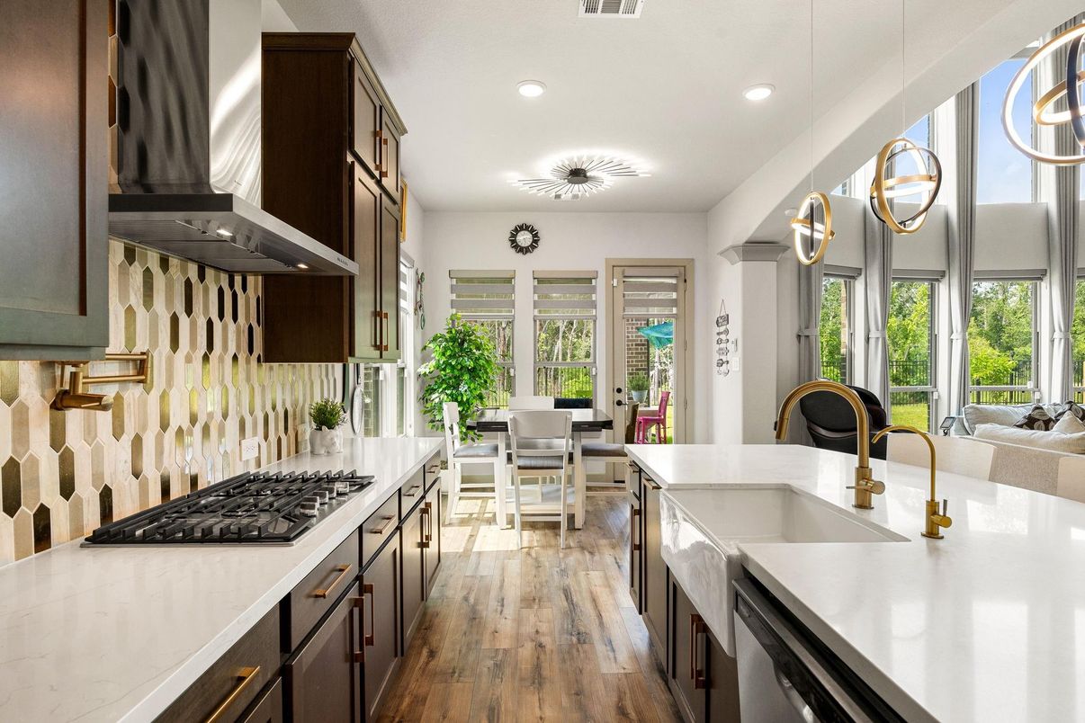 Dining room, Interior, Kitchen, Pendant Lights, Recessed Lighting, Stainless Steel Appliances, Wood Texture Flooring