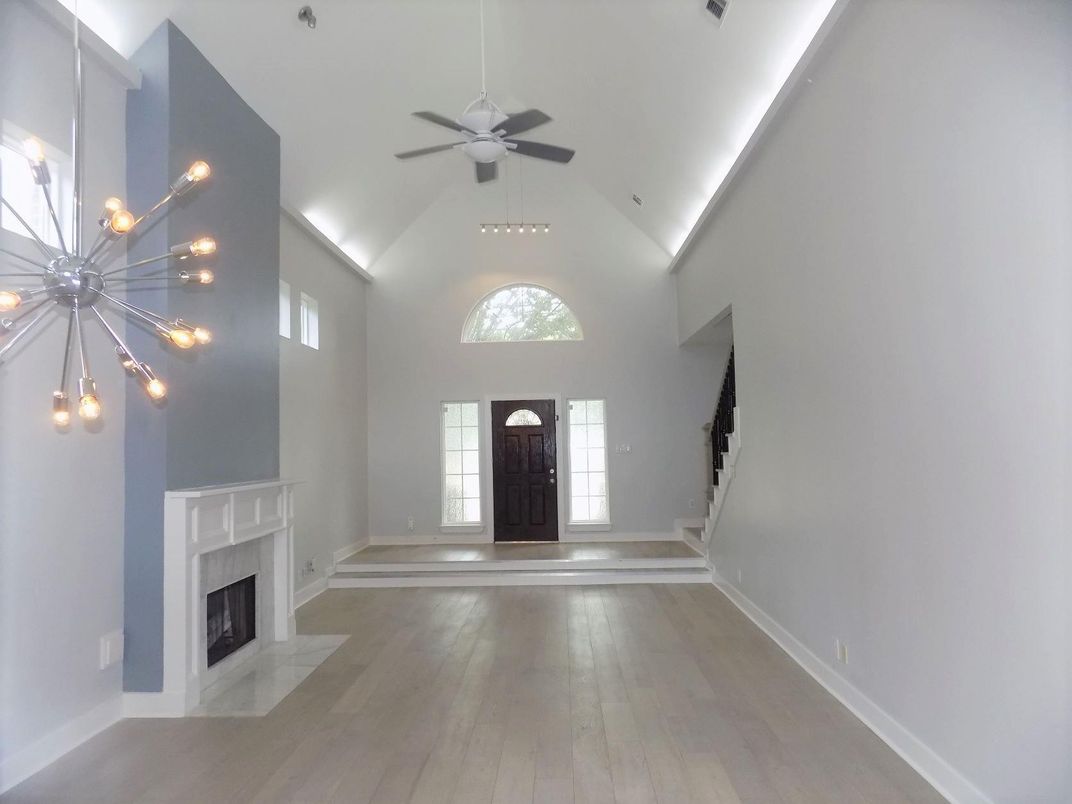 Fireplace, Interior, Pendant Lights, Recessed Lighting, Wood Texture Flooring
