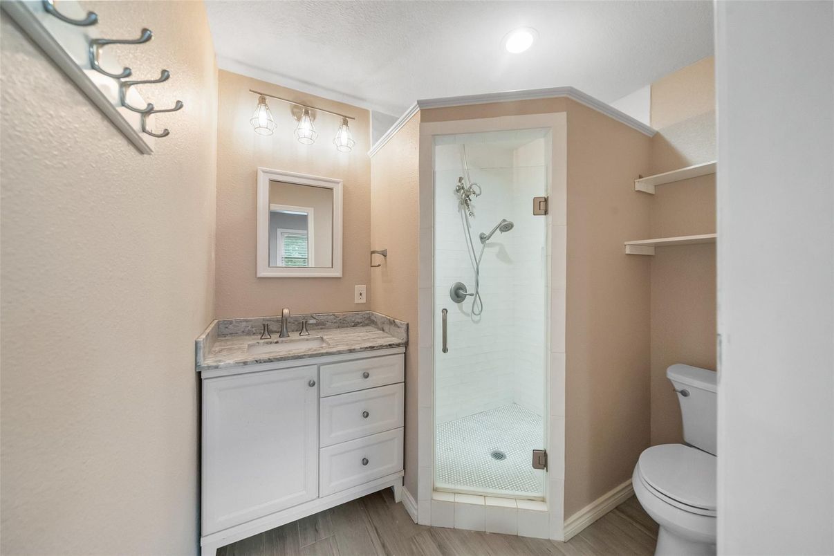 Bathroom, Glass Shower, Interior, Recessed Lighting, Wood Texture Flooring