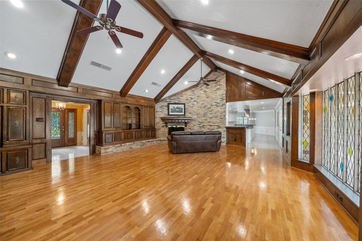 Empty room, Fireplace, Interior, Recessed Lighting, Stone Walls, Wooden Beams, Wood Texture Flooring, Wooden Walls