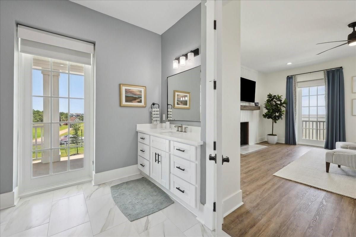 Bathroom, Dual Sink Vanities, Fireplace, Interior, Marble, Recessed Lighting, Wood Texture Flooring