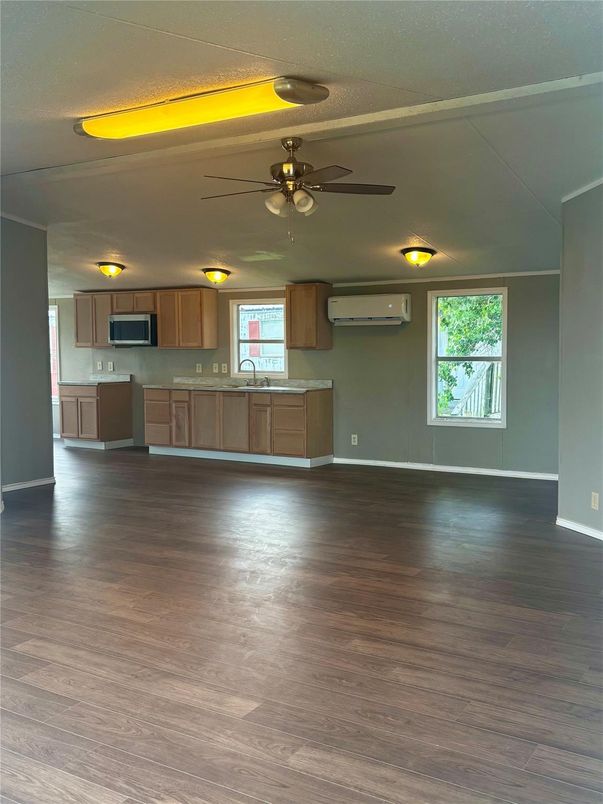 Empty room, Interior, Kitchen, Stainless Steel Appliances, Wood Texture Flooring