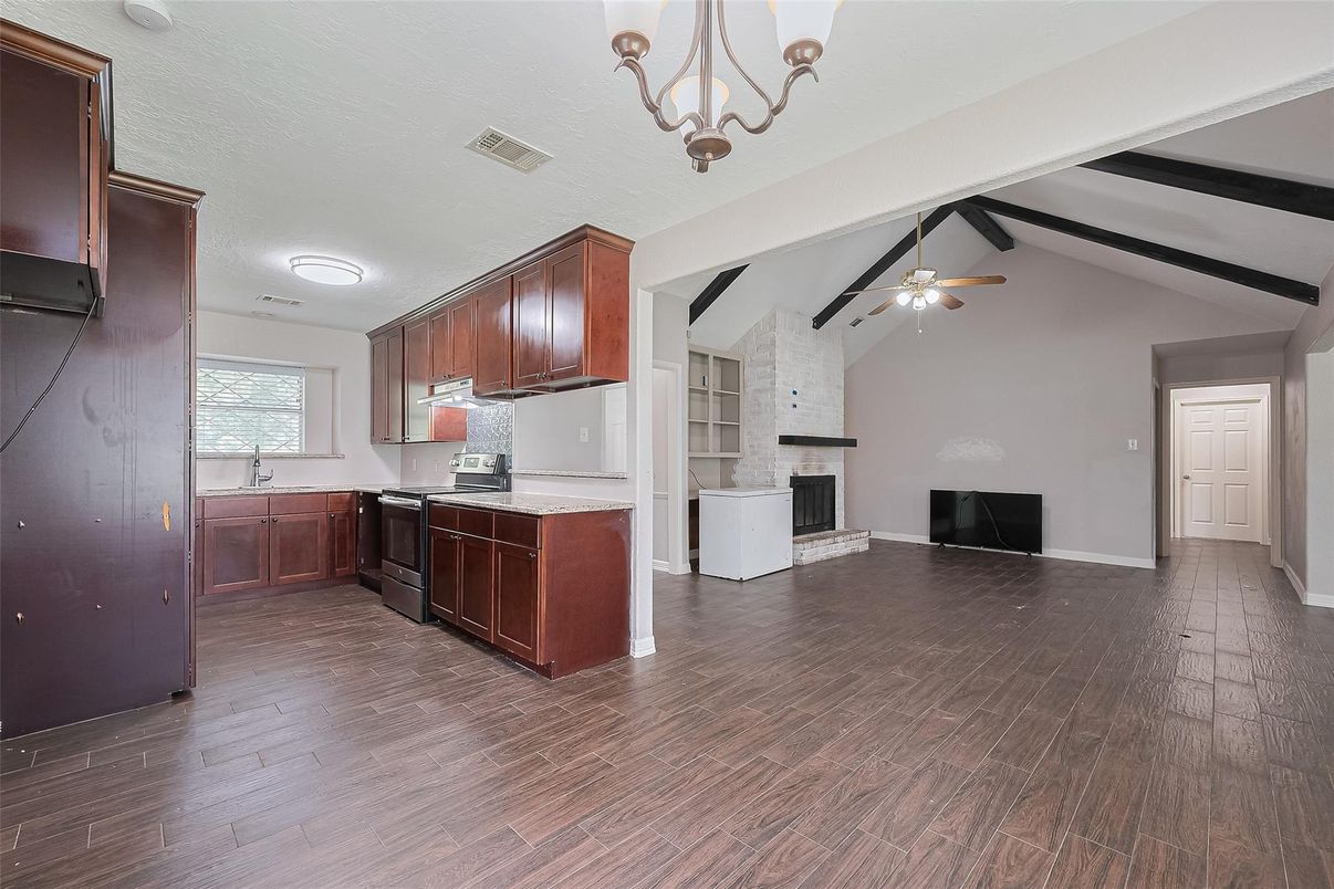 Chandelier, Fireplace, Interior, Kitchen, Stone Walls, Wood Texture Flooring