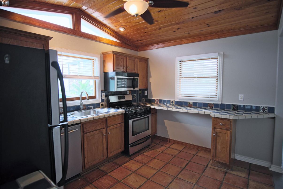 Interior, Kitchen, Recessed Lighting, Tile Countertops, Wooden Ceilings