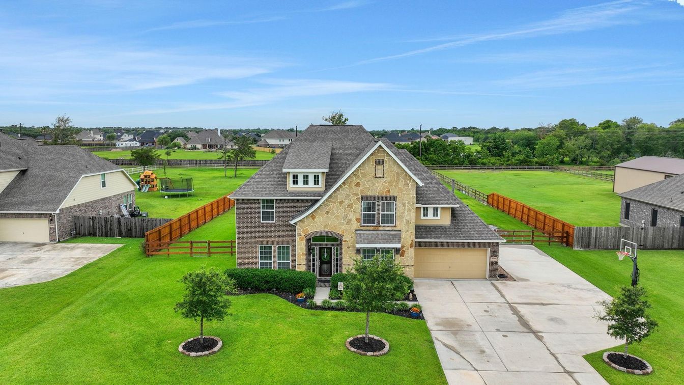 Attached, Backyard, Exterior, Facade, Brick Facade, French Provincial