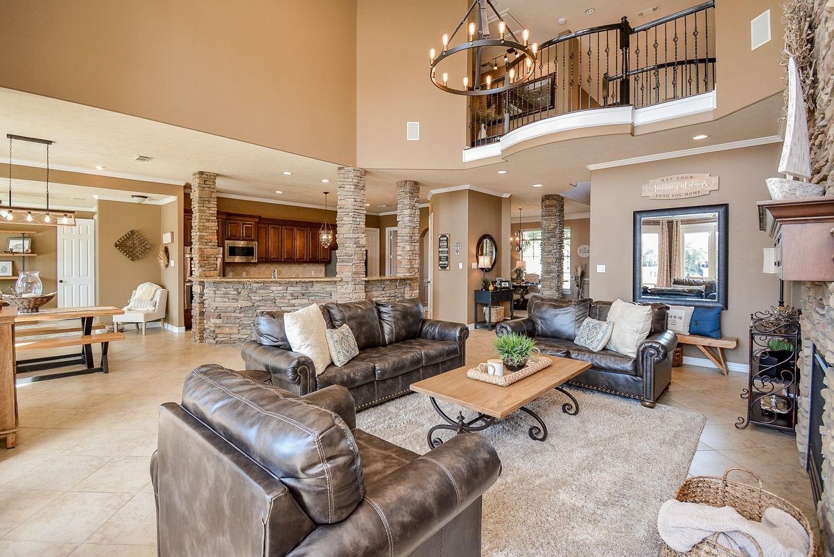 Chandelier, Dining room, Fireplace, Interior, Living room, Pendant Lights, Recessed Lighting, Stone Walls