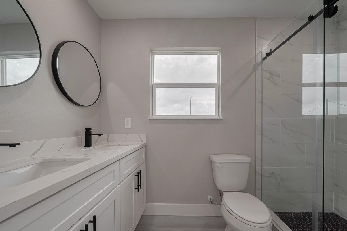 Bathroom, Dual Sink Vanities, Glass Shower, Interior, Marble Walls