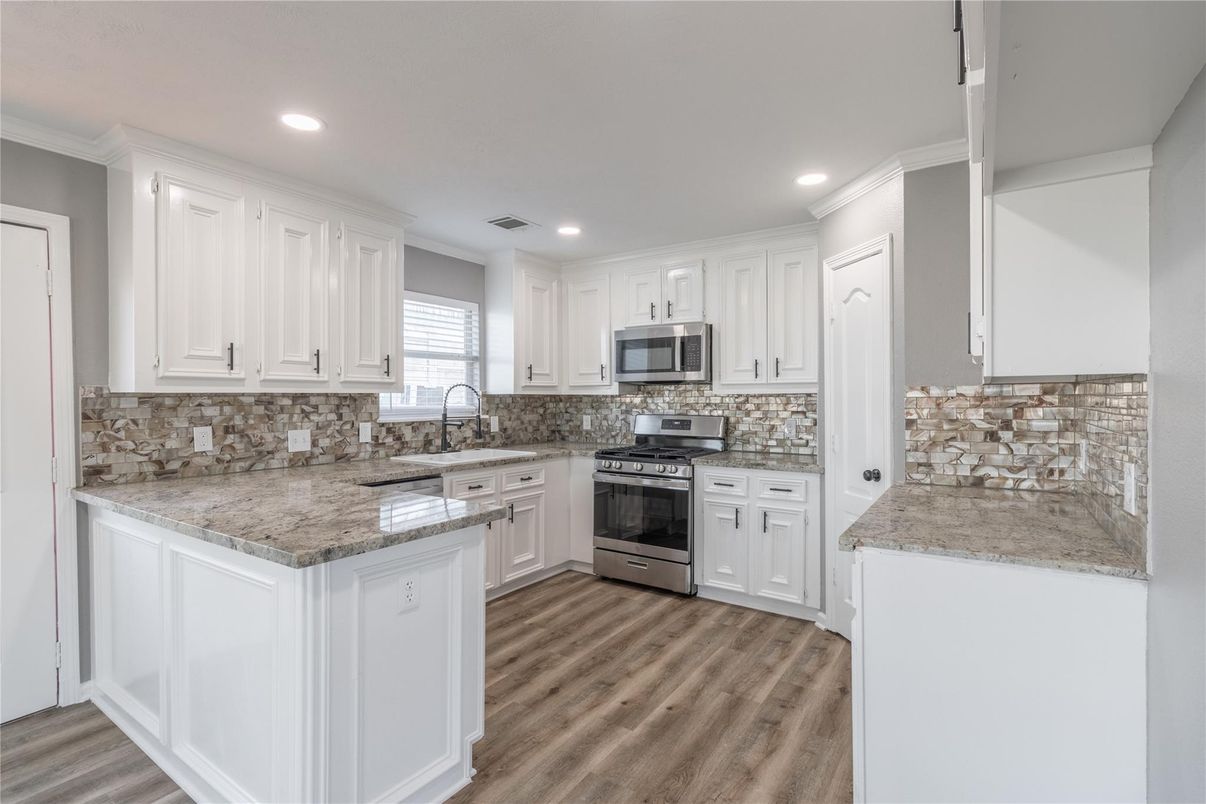 Interior, Kitchen, Recessed Lighting, Stainless Steel Appliances, Wood Texture Flooring