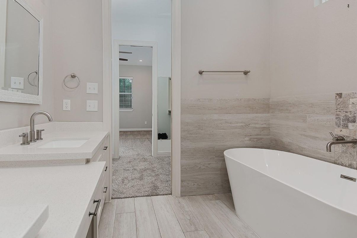 Bathroom, Dual Sink Vanities, Free Standing Baths, Interior, Recessed Lighting, Wood Texture Flooring