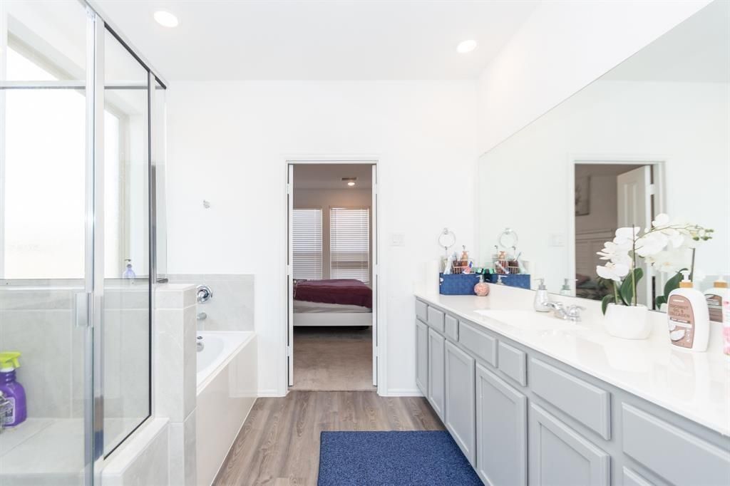 Bathroom, Bedroom, Glass Shower, Interior, Recessed Lighting, Wood Texture Flooring