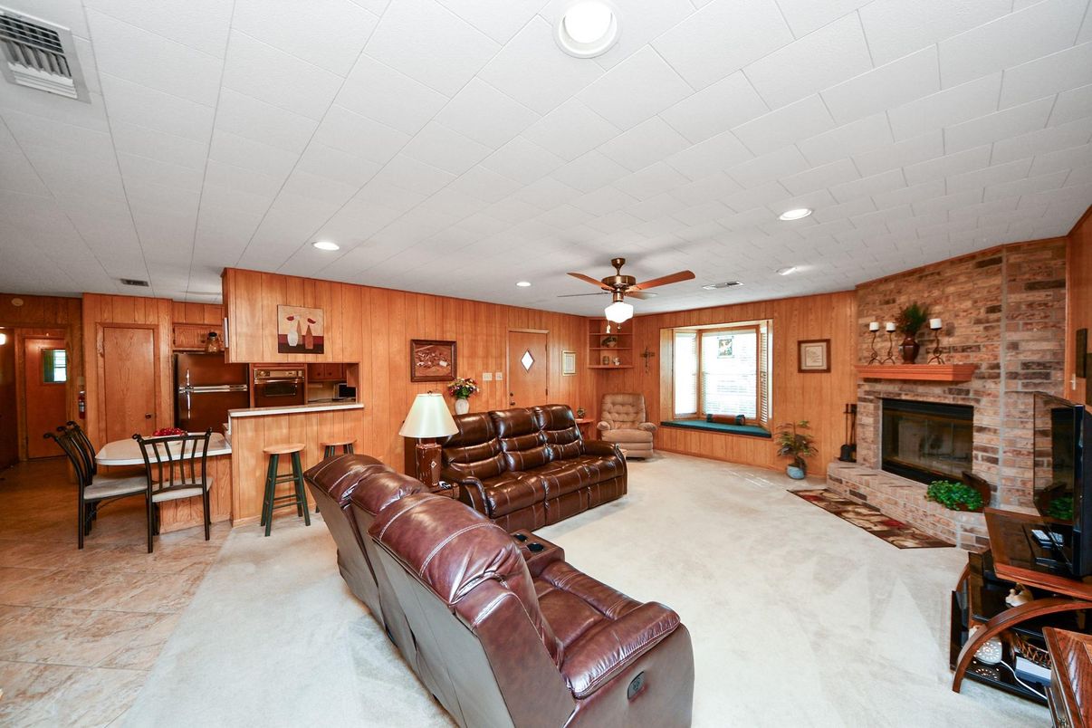 Fireplace, Interior, Kitchen, Living room, Recessed Lighting, Stone Walls, Wooden Walls